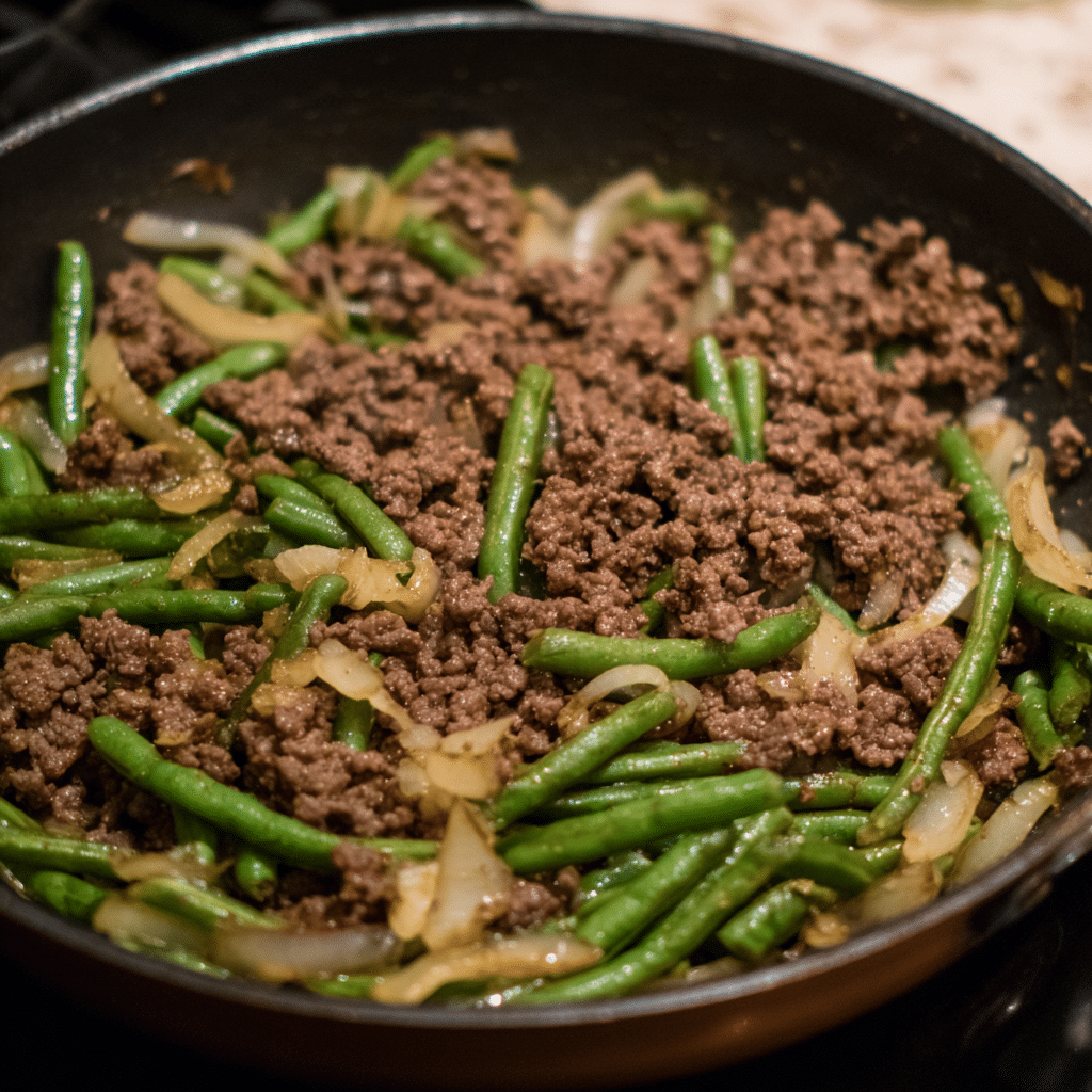 Asian Ground Beef & Green Bean Stir-Fry mixes beef, beans, and sauce into a quick, flavorful stovetop dish.