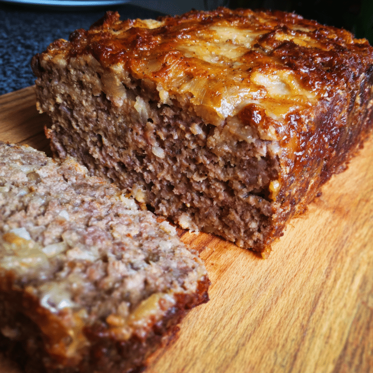 Classic French Onion Meatloaf with Gruyère layers beef with caramelized onions and cheese for a bold, rich variation.