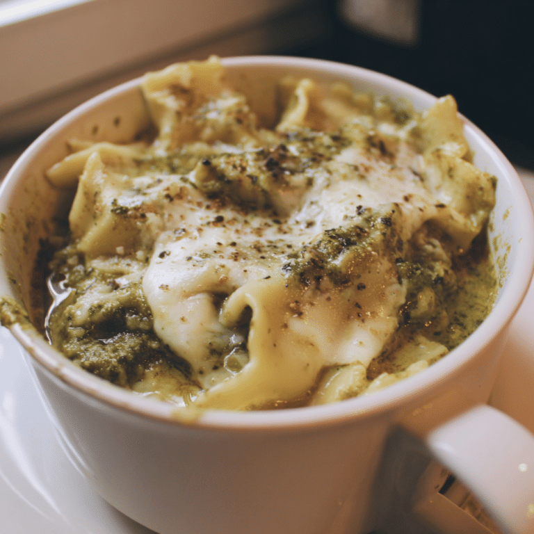 Creamy Pesto Lasagna Soup with Mozzarella combines basil pesto, pasta, and cheese into a flavorful and aromatic soup.