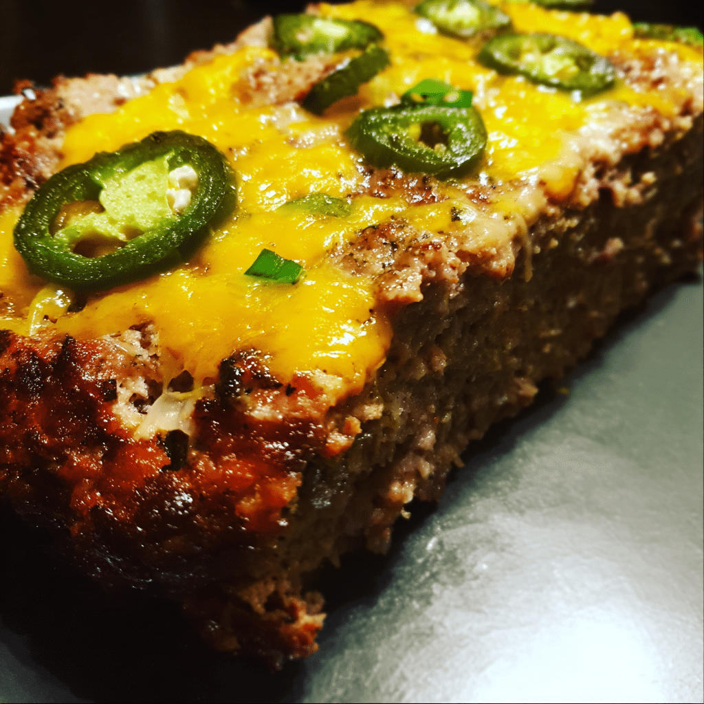 Jalapeño Cheddar Meatloaf mixes beef, cheese, and spicy peppers into a bold, flavorful variation.