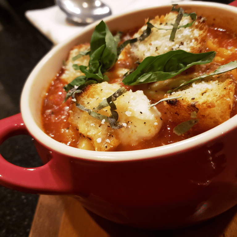 One Pot Lasagna Soup with Garlic Bread Croutons combines pasta and broth topped with crispy, garlicky croutons for a comforting twist.