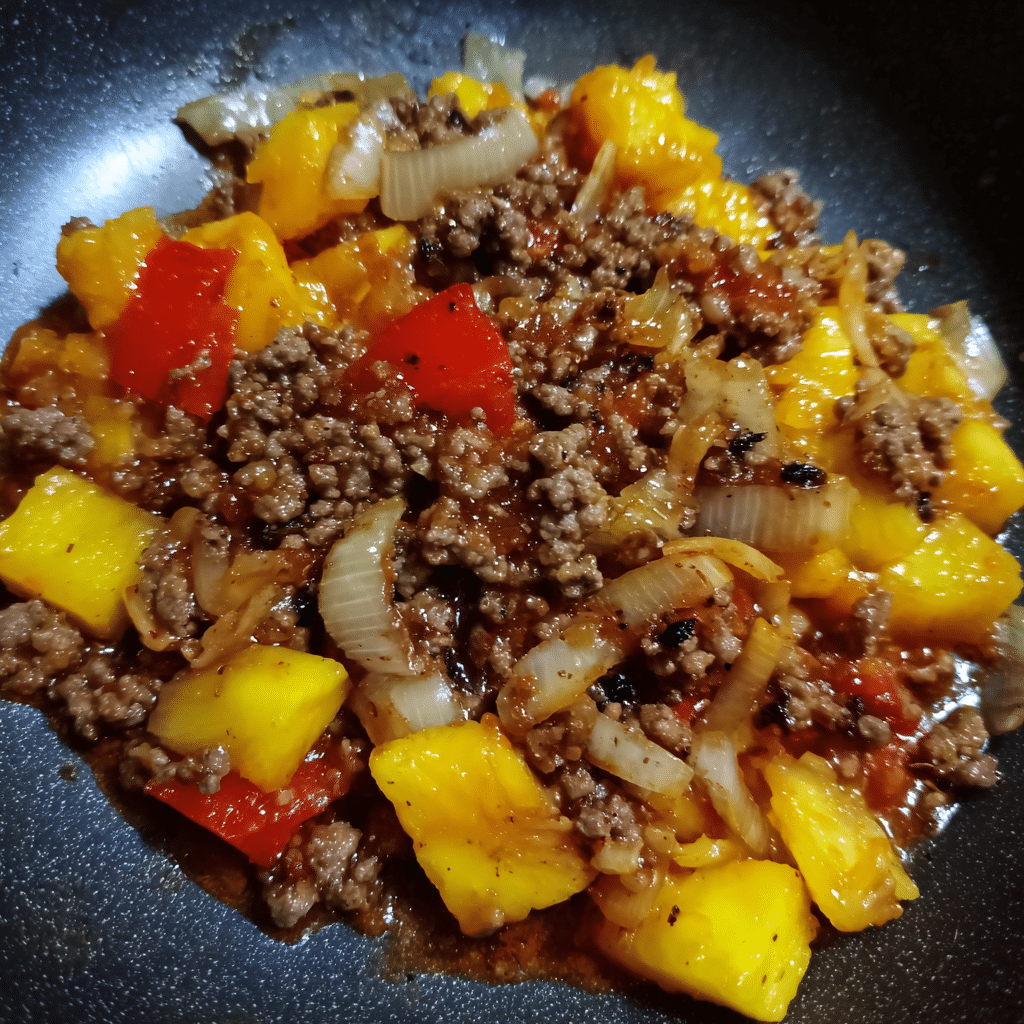 Sweet & Sour Ground Beef with Pineapple combines savory beef with pineapple and tangy sauce for a bold, flavorful dish.