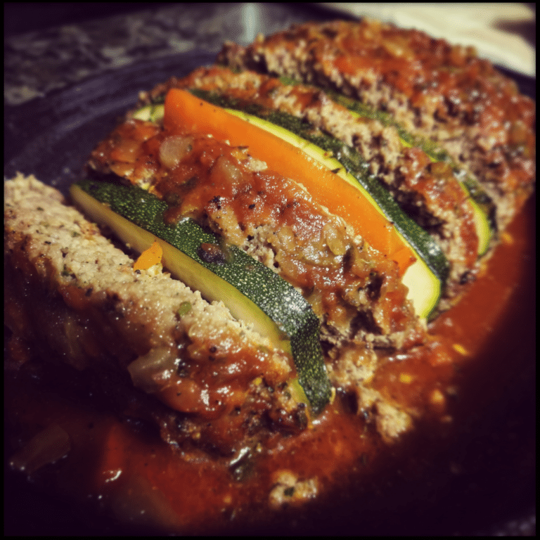 Veggie-Packed Meatloaf with Zucchini and Carrots blends beef with fresh vegetables for a lighter, nutrient-rich dinner.