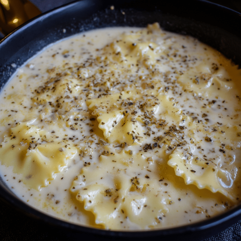 White Sauce Lasagna Soup with Alfredo Twist features creamy Alfredo-inspired broth with pasta and herbs, delivering a rich take on the classic soup.